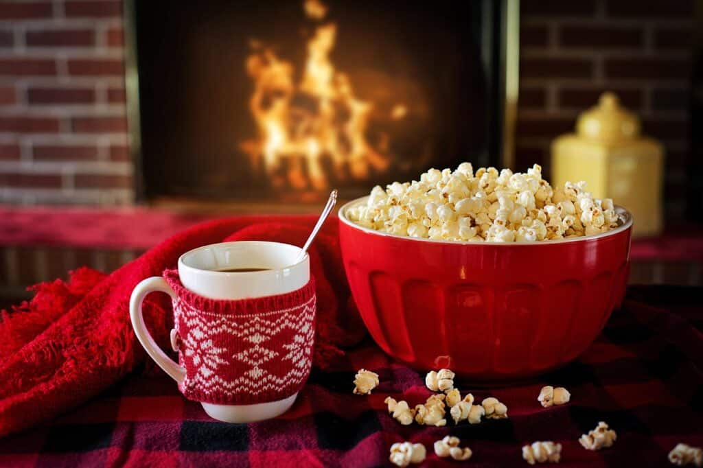 warm and cozy, popcorn, coffee, fireplace, cozy, warm, home, christmas, cold, coffee cup, fire, cup, comfort, comfortable, mug